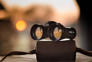 binoculars on a bag to symbolize deciphering a google ads strategy